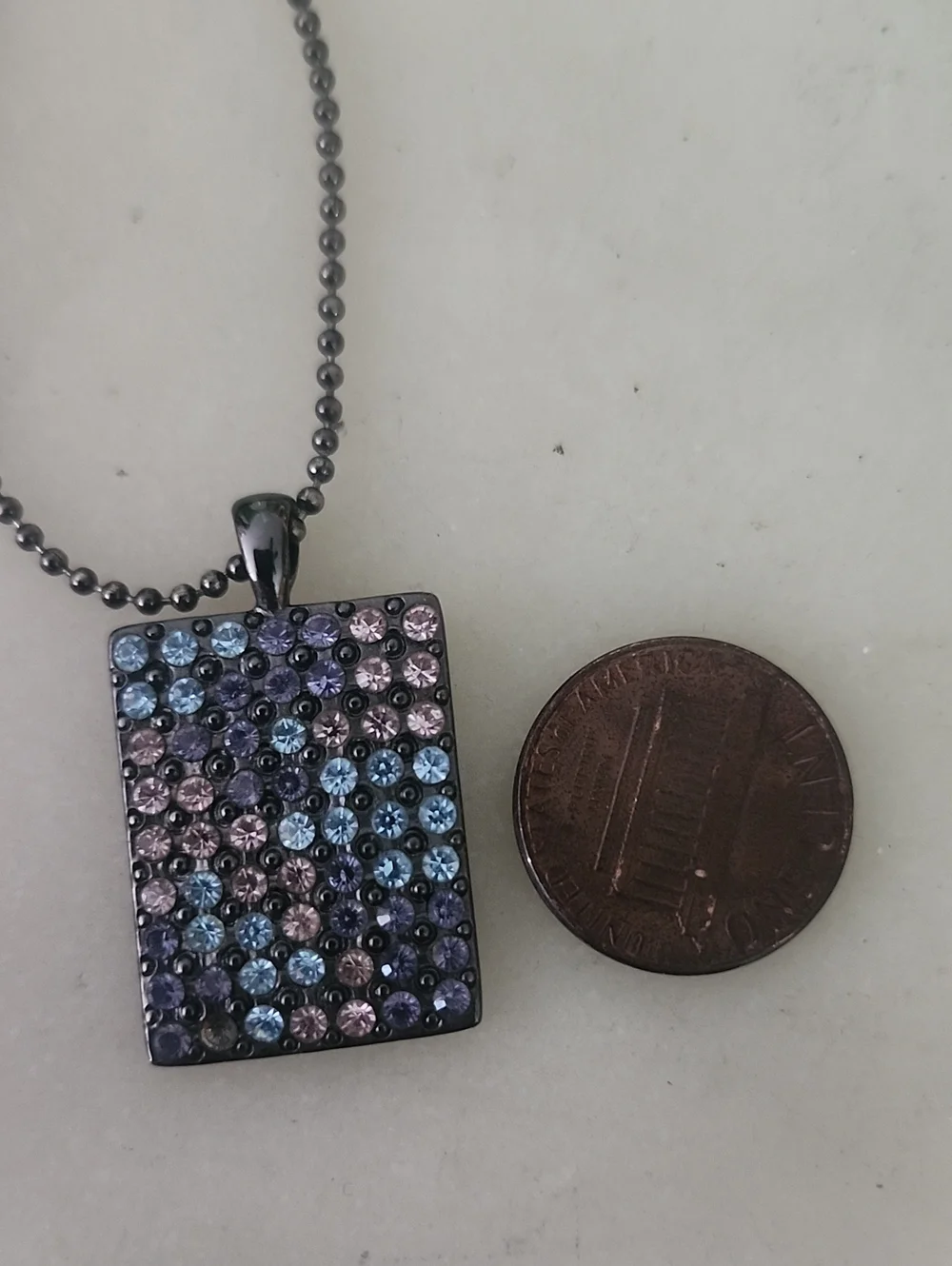 GUESS Gunmetal Rectangular Pendant with Multicolor Pave Crystals